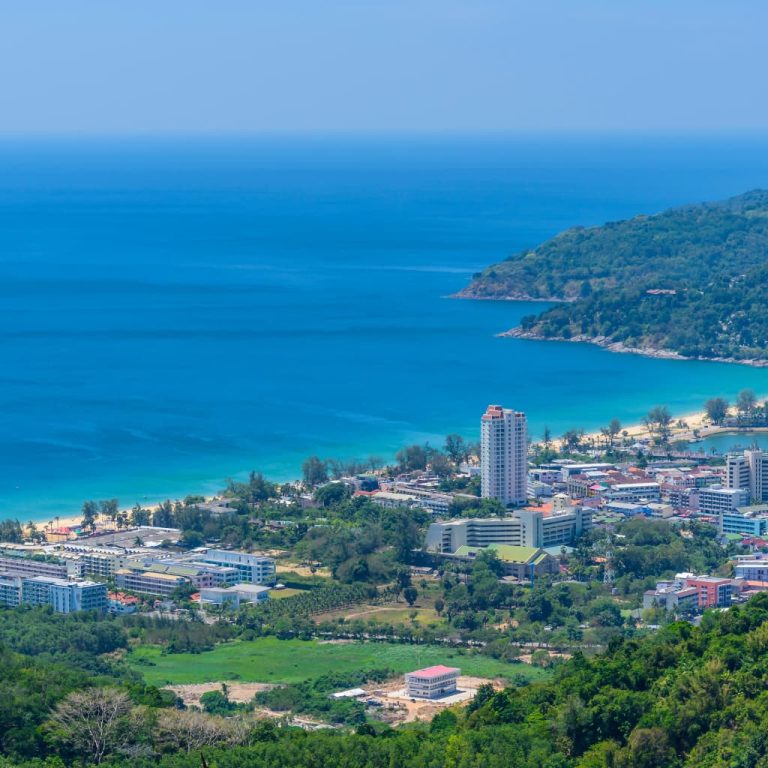 Panoramic coastal view of Phuket Thailand from scenic viewpoint overlooking the Andaman Sea